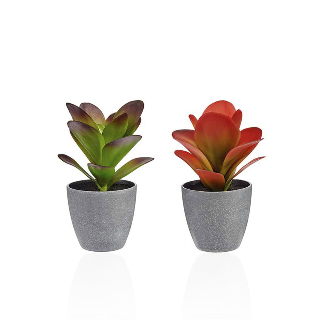Jarrón gris con planta artificial de hoja ancha